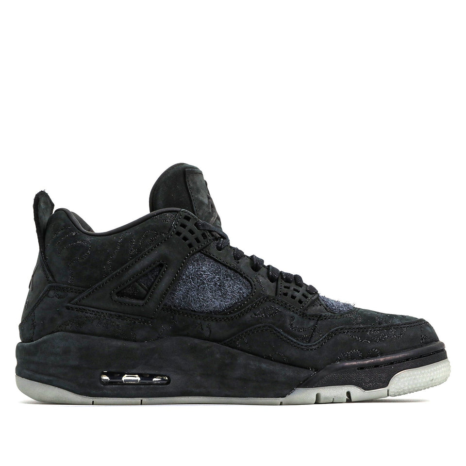 Nike KAWS x Air Jordan 4 Retro 'Black' Black/Black-Clear Glow 930155-001 01
