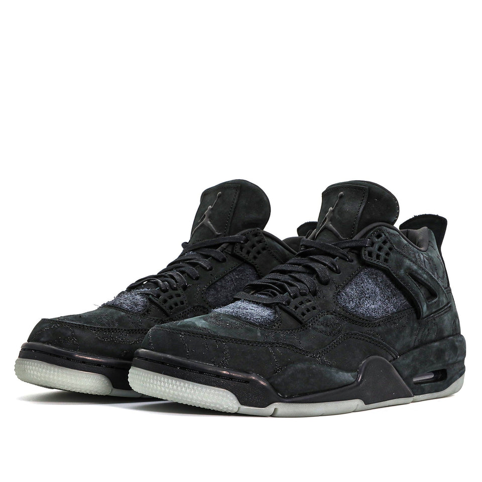 Nike KAWS x Air Jordan 4 Retro 'Black' Black/Black-Clear Glow 930155-001 01