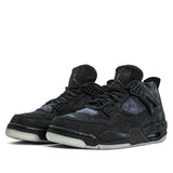 Nike KAWS x Air Jordan 4 Retro 'Black' Black/Black-Clear Glow 930155-001 01