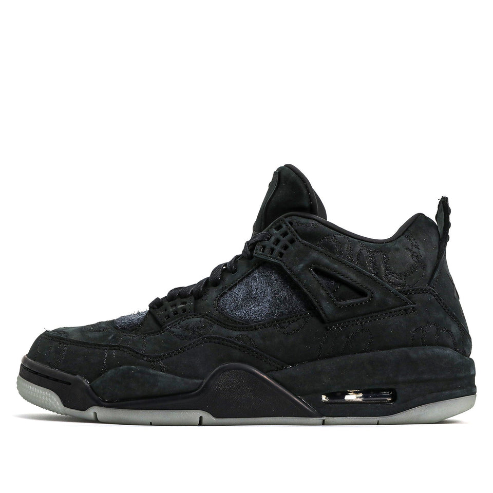 Nike KAWS x Air Jordan 4 Retro 'Black' Black/Black-Clear Glow 930155-001 01