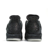 Nike KAWS x Air Jordan 4 Retro 'Black' Black/Black-Clear Glow 930155-001 01